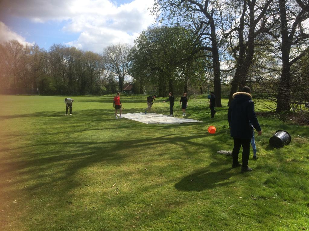 SBCC Members cleaning cricket covers at Dulwlich Sports Ground